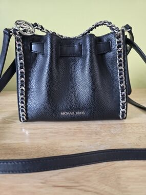 Michael Kors Mina Small Chain Crossbody Bag in black.